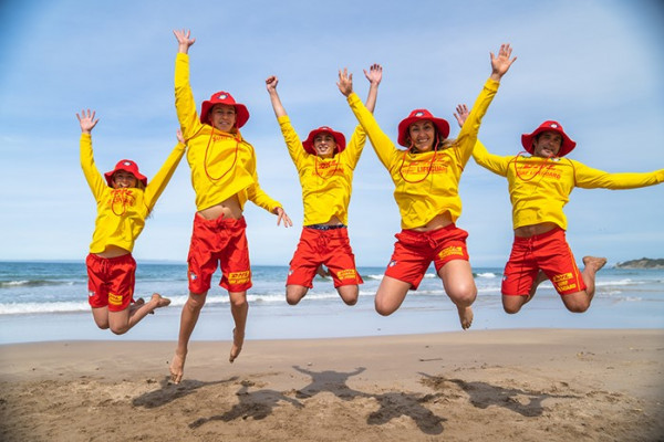Picture of New Zealand Surf Lifesavers jumping in the air